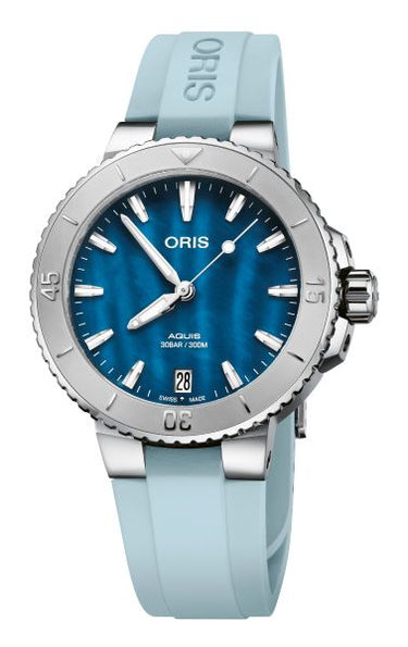 Stainless steel dive watch with blue sunray dial and light blue rubber strap
