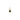 Gold star-shaped pendant charm with black enamel center on white background