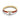 Gold ring with red enamel accents and a triangle-shaped clear gemstone center
