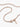 Rose gold chain necklace with lobster clasp and small engraved tag on white background