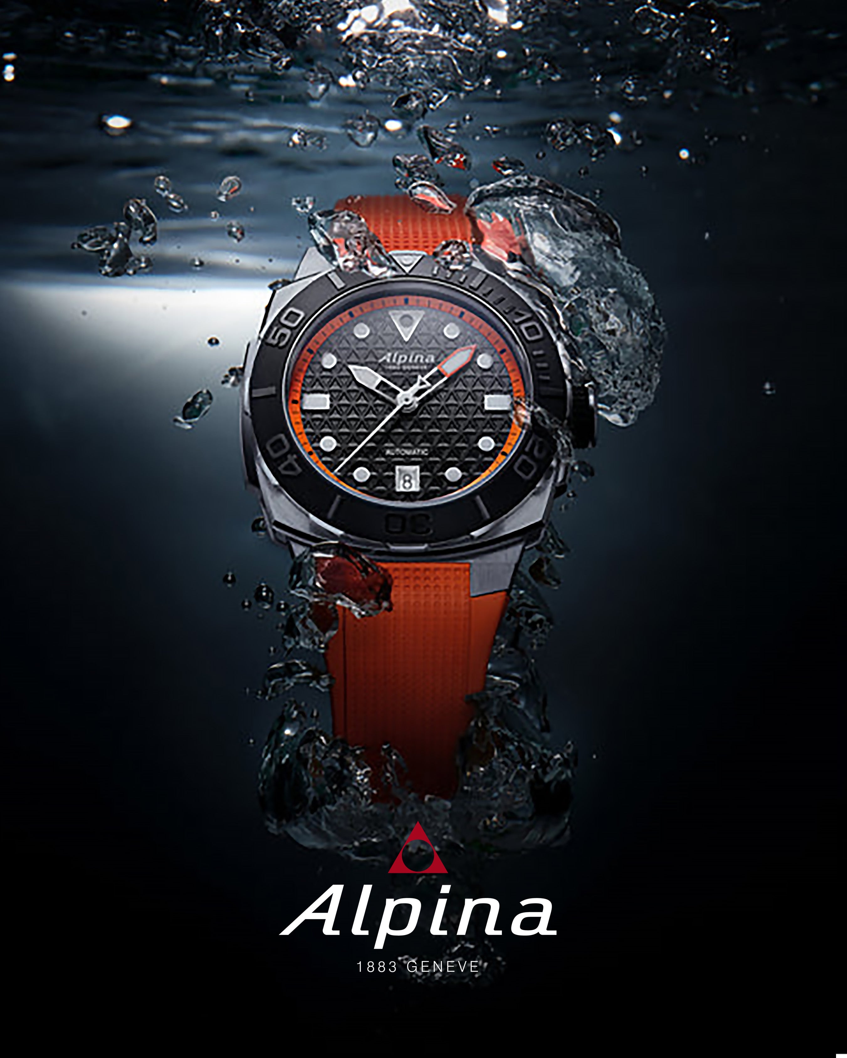 Alpina dive watch with orange strap underwater, durable luxury sports watch design