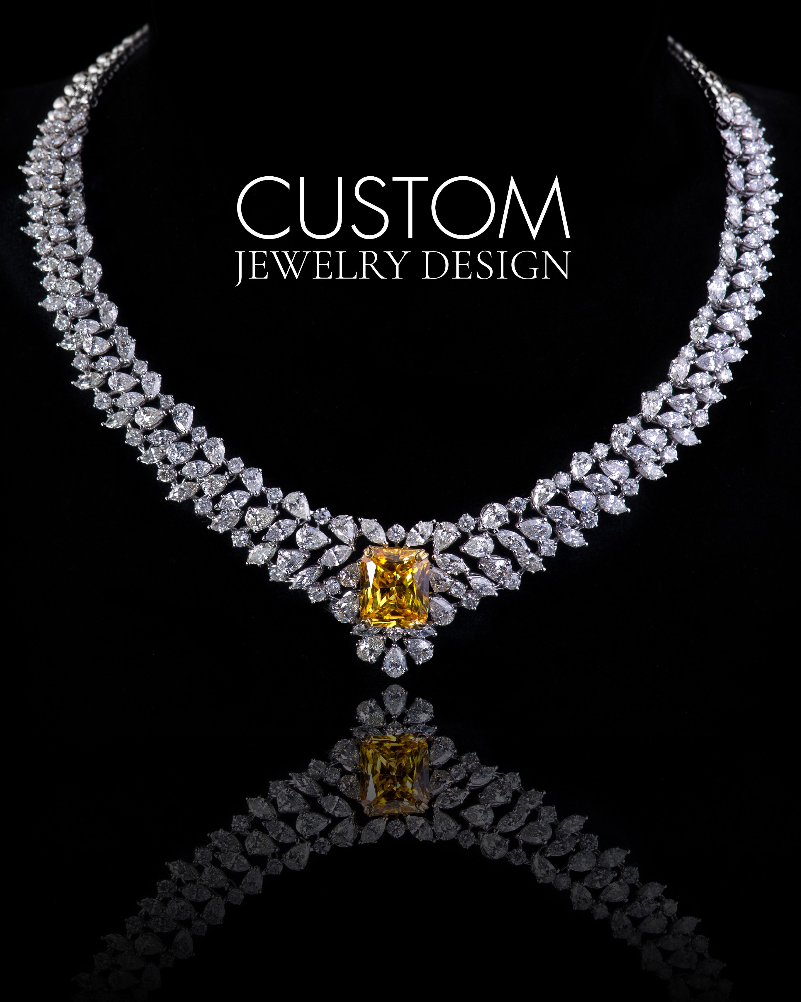 Custom diamond necklace with a large yellow gemstone center on black background