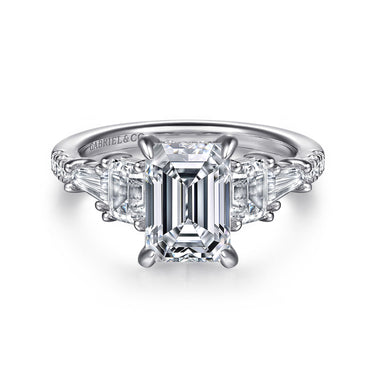 Emerald cut diamond engagement ring with side stones in white gold setting