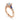 Rose gold engagement ring with round diamond center, pear-shaped blue sapphires, and accent diamonds