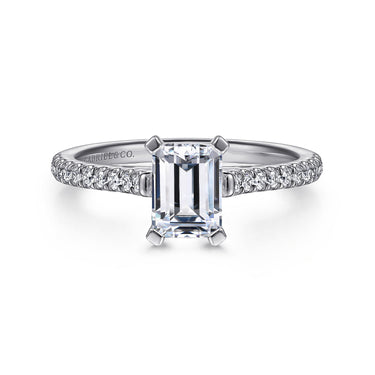 Emerald cut diamond engagement ring with pavé diamond band in white gold