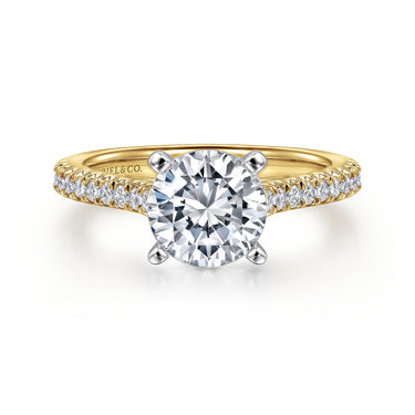 Yellow gold diamond engagement ring with round solitaire and pavé diamond band