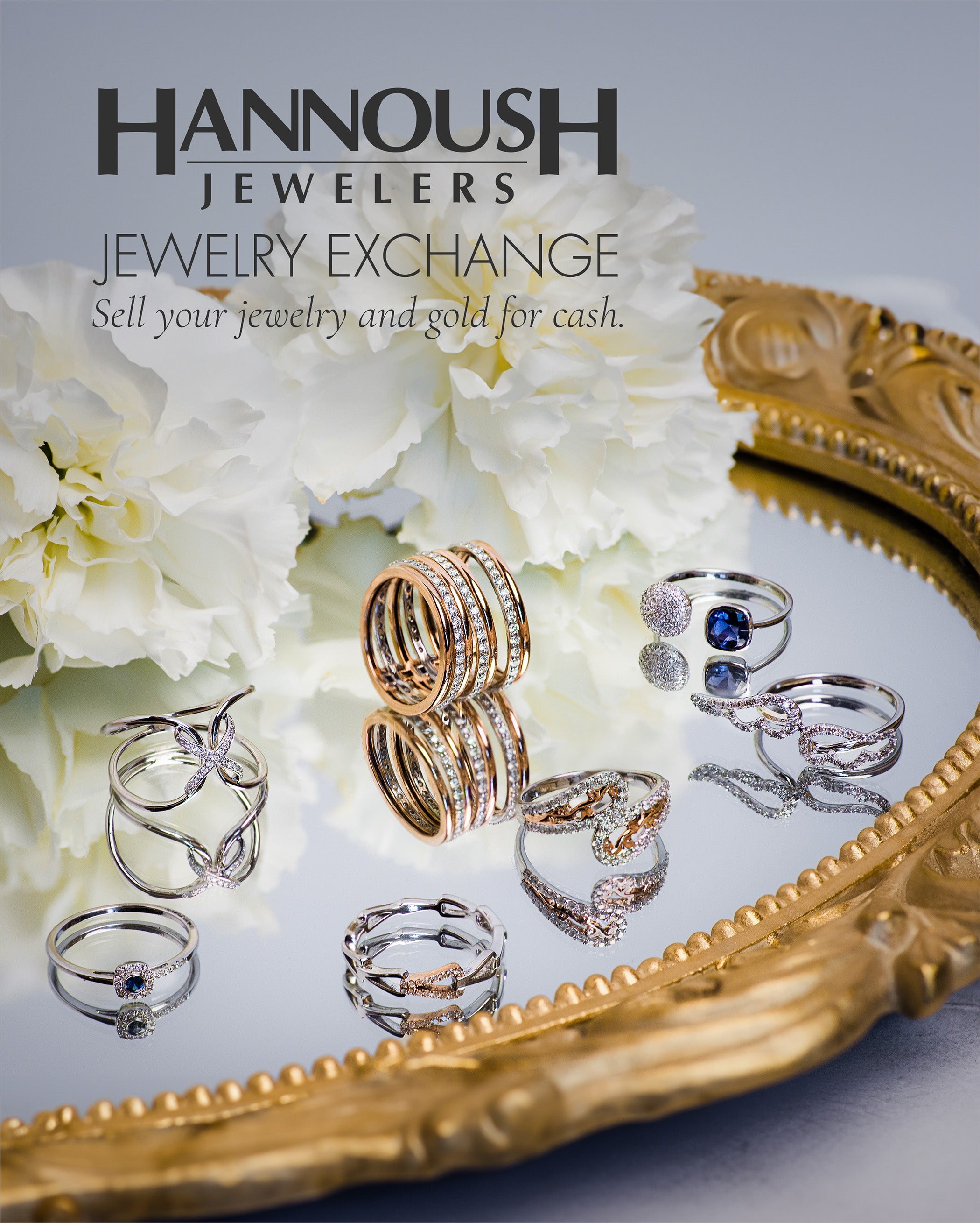 Gold and diamond rings displayed on ornate mirror with white flowers, jewelry exchange promotion.