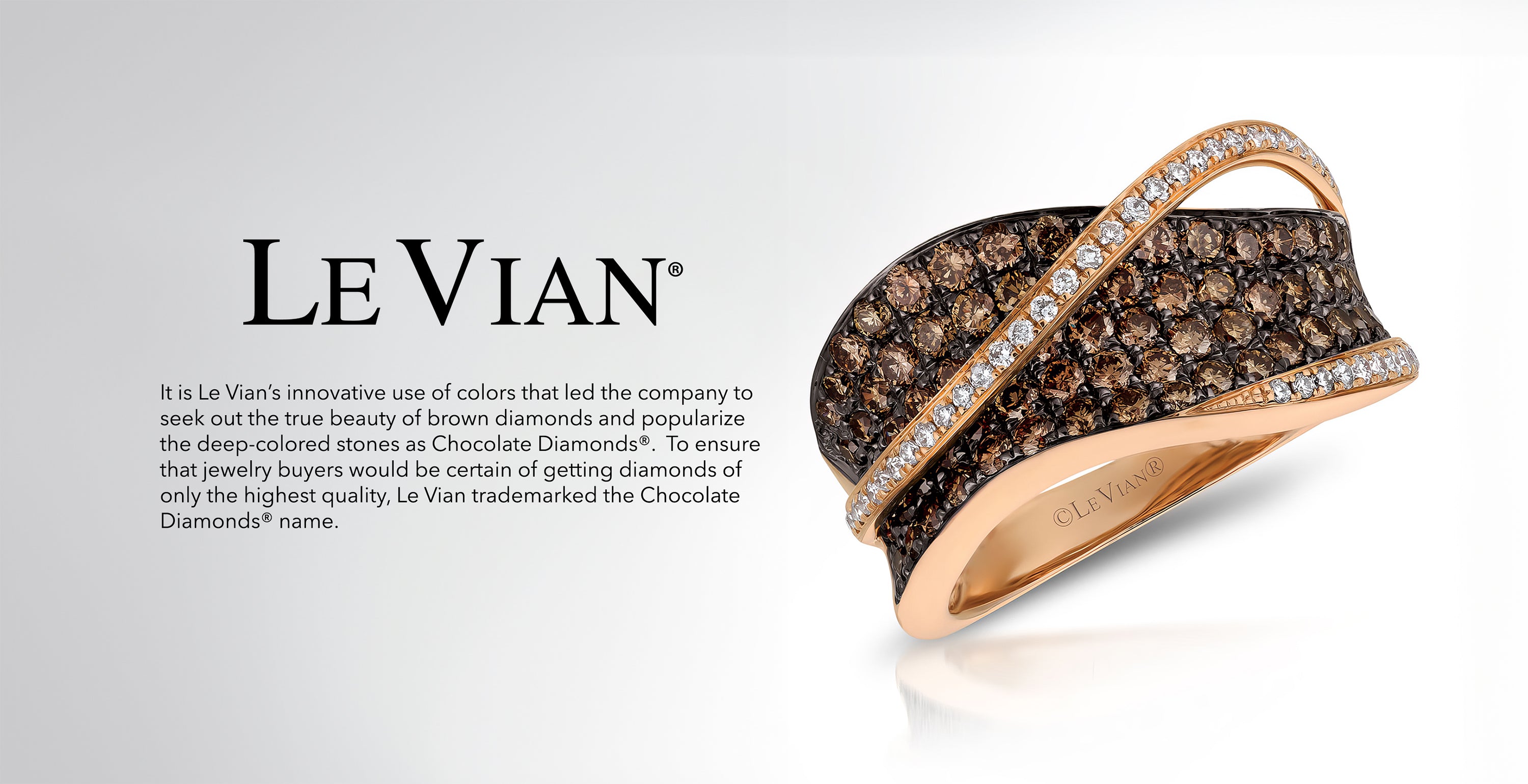 Rose gold ring with brown and white diamonds against a light background, Le Vian logo visible.
