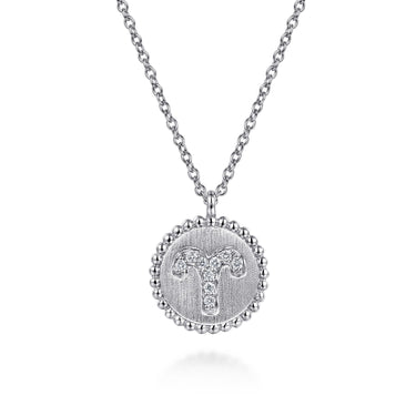 Silver Aries zodiac pendant necklace with diamond accents on a delicate chain