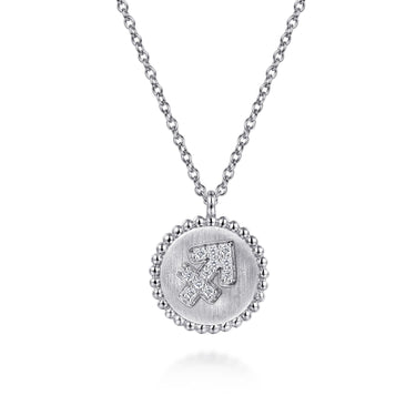 Silver pendant necklace with beaded edge and diamond Sagittarius zodiac symbol