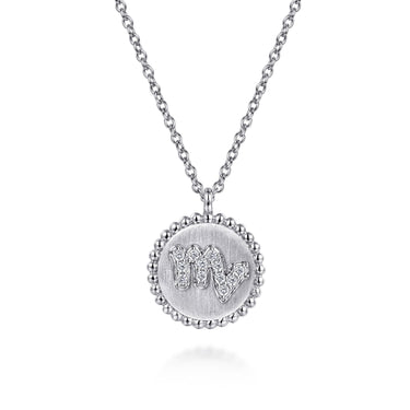 Silver round pendant necklace with diamond-studded Virgo zodiac symbol