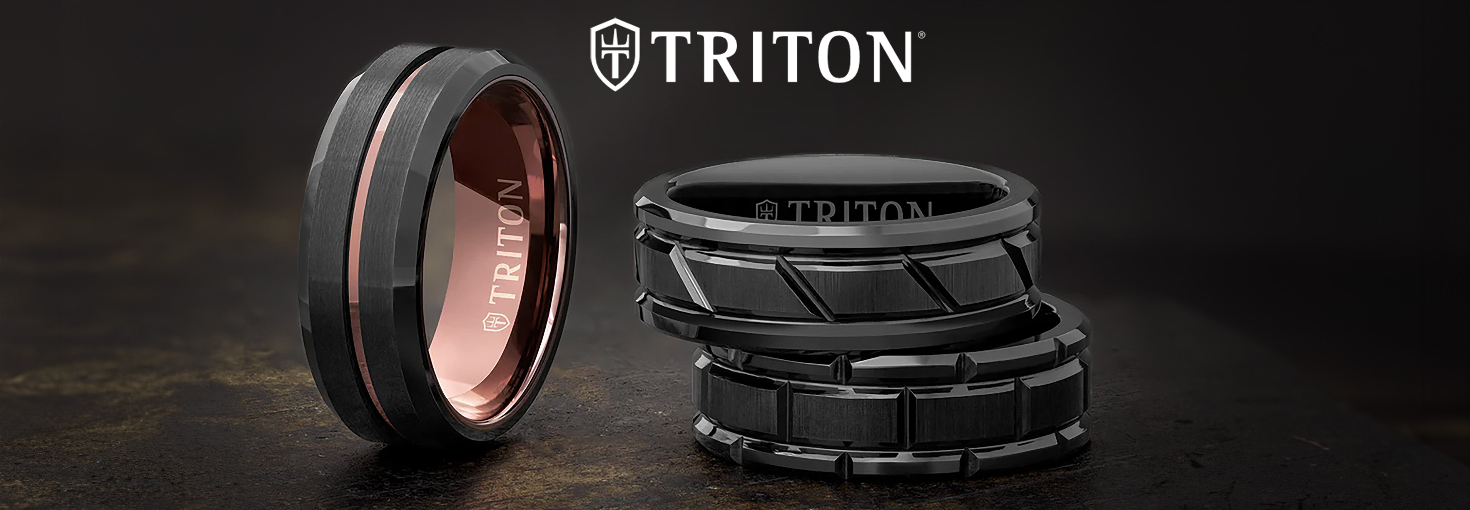 Black tungsten men's rings with geometric designs and rose gold accents on dark background