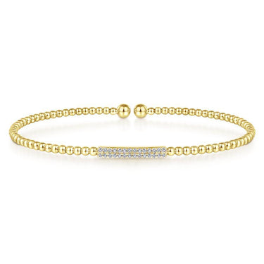 Gold beaded bracelet with pavé diamond bar accent on white background
