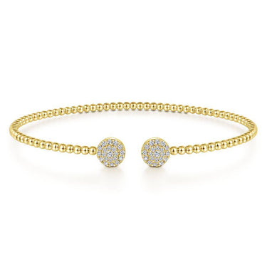 Gold beaded cuff bracelet with diamond pavé circle ends, elegant fine jewelry on white background