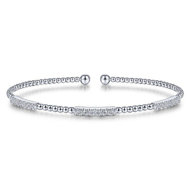 White gold beaded cuff bracelet with pavé diamonds on a white background