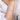 Elegant diamond tennis bracelet on wrist with white blouse background