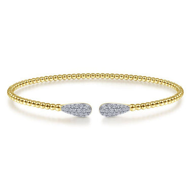 Open gold beaded bangle bracelet with diamond-accented teardrop ends