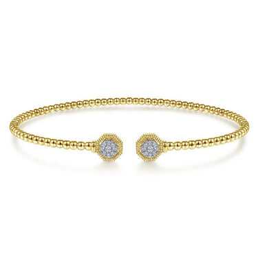 Yellow gold beaded cuff bracelet with hexagon diamond accents on each end, elegant jewelry