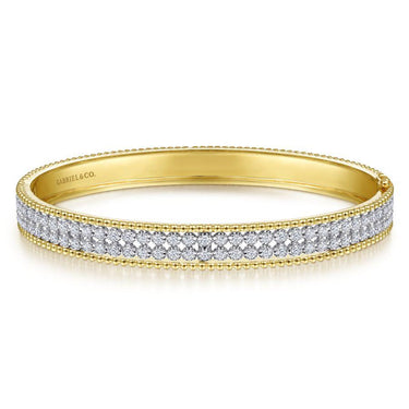Yellow gold diamond bangle bracelet with double row pavé setting, luxury jewelry