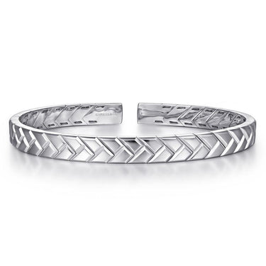 Men's silver cuff bracelet with geometric chevron pattern on white background.