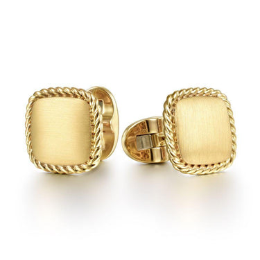 Square gold cufflinks with twisted rope border on white background