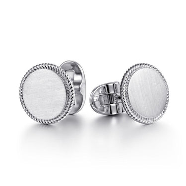 Round silver cufflinks with textured rope edge on white background