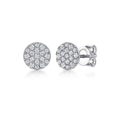 Round white gold diamond pavé stud earrings with butterfly backings on white background