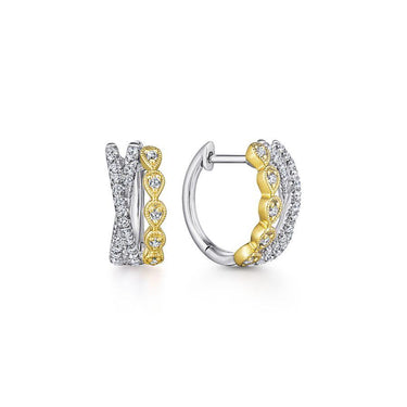 Two-tone gold and diamond hoop earrings with intertwined pave and beaded designs