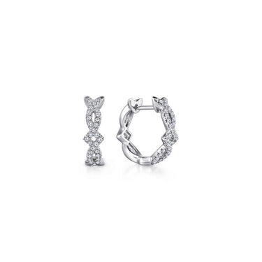 White gold diamond hoop earrings with twisted design on white background