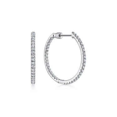 White gold hoop earrings with pavé set diamonds on white background