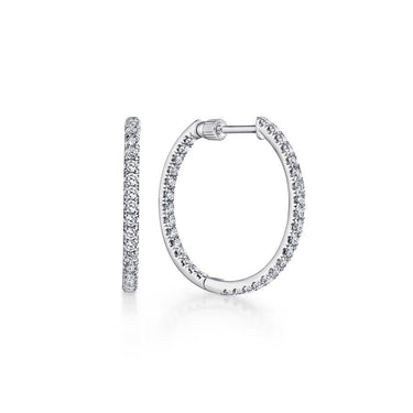 White gold diamond hoop earrings with pavé setting on a white background