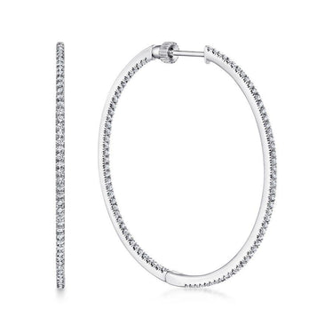 White gold diamond hoop earrings with sparkling round stones displayed on a white background