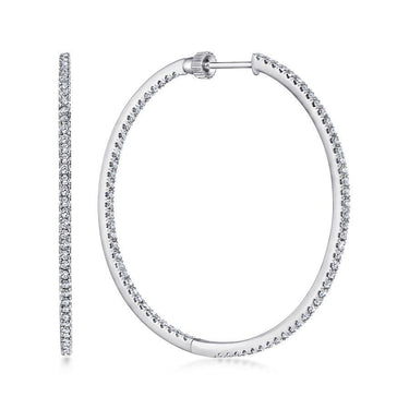 White gold diamond hoop earrings with pave set round diamonds, shown front and side view
