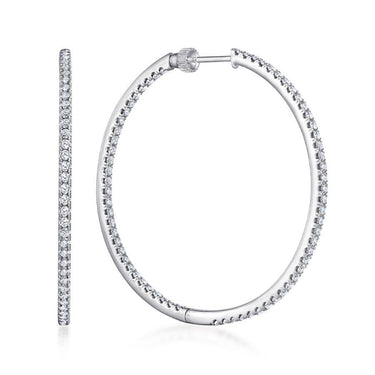 White gold hoop earrings with pavé-set round diamonds, displayed from side and front angles