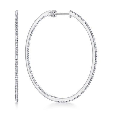 Large white gold hoop earrings with rows of sparkling round diamonds, modern jewelry