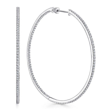 Large white gold hoop earrings with pavé diamonds, elegant oval shape, fashion jewelry