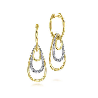 Gold and diamond drop earrings with twisted rope design and teardrop shapes on white background