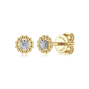 Yellow gold stud earrings with round center diamonds and beaded halo design on white background