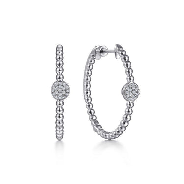 Sterling silver beaded hoop earrings with round pavé diamond accents on white background