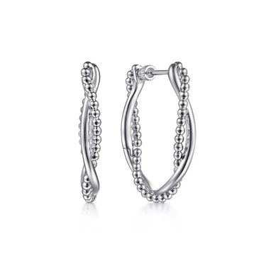 Sterling silver hoop earrings with beaded and twisted design on white background