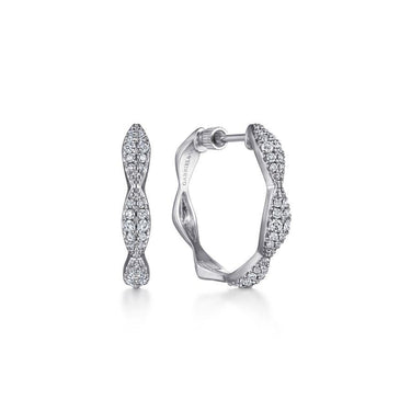 White gold twisted hoop earrings with pavé diamonds on a plain background