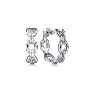 Pair of silver chain link hoop earrings with intricate detailing on white background
