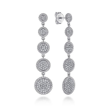 Pair of white gold dangle earrings with round pavé diamond clusters, beaded edge detail.