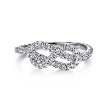 Infinity twist diamond ring in white gold with pavé setting, elegant fine jewelry