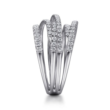 Multi-row white gold ring with overlapping diamond bands on a white background
