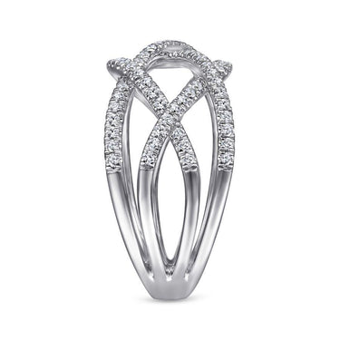White gold statement ring with intersecting bands and pavé diamonds in a modern design