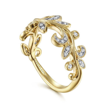Yellow gold ring with diamond leaf design and intricate milgrain detailing