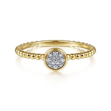 Yellow gold beaded band ring with round diamond cluster center, elegant fine jewelry.