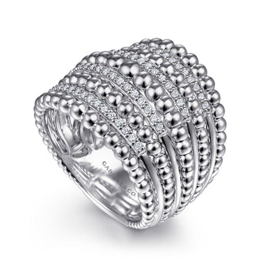 Wide silver fashion ring with beaded rows and pavé-set diamonds in a modern design