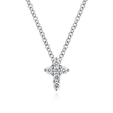 White gold chain necklace with diamond cross pendant on white background
